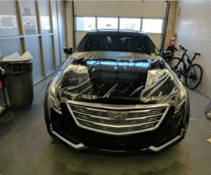 Applying Paint Protection Film on a black car